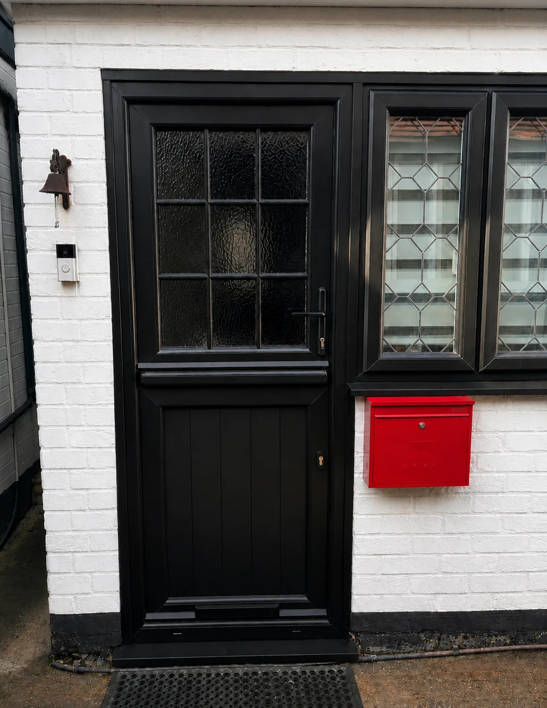 black upvc barn style door