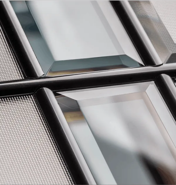 Aurora composite door glass, a grid of clear bevelled panes in dark leading over reeded glass