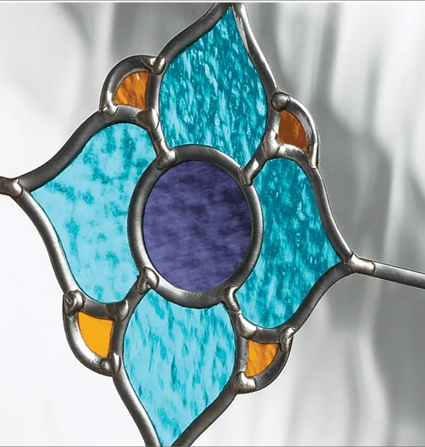 Dorchester composite door glass, a blue and amber stained glass flower in grey leading