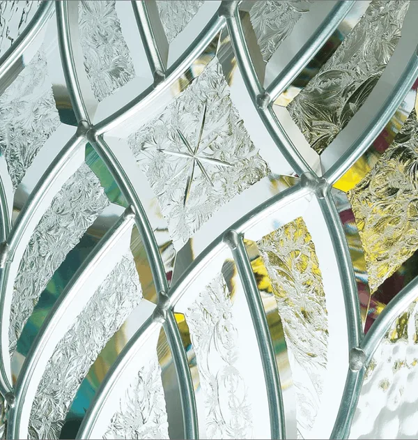 Elegance composite door glass, curving leading with clear bevels over textured glass