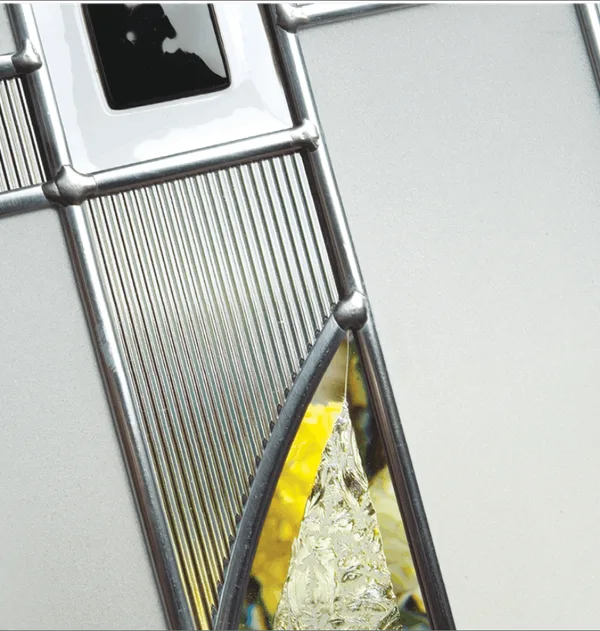 Modena composite door glass, reeded and clear strips with a small yellow pane in silver leading